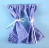 Pair Of Blue Gingham Curtains On Pole